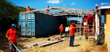 Fixing and Painting our roof and container